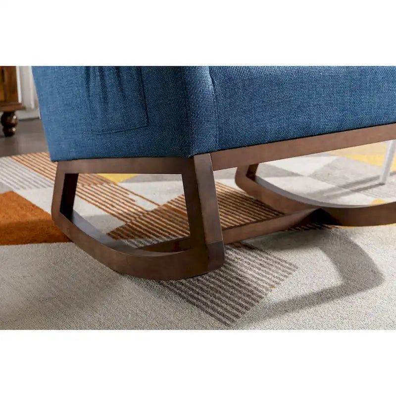 Mecedora tapizada azul 27 con patas de madera y práctico bolsillo lateral
