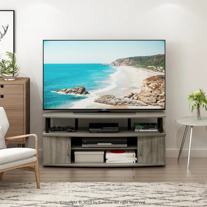 Mueble grande de entretenimiento. Soporta televisores de hasta 55 pulgadas.