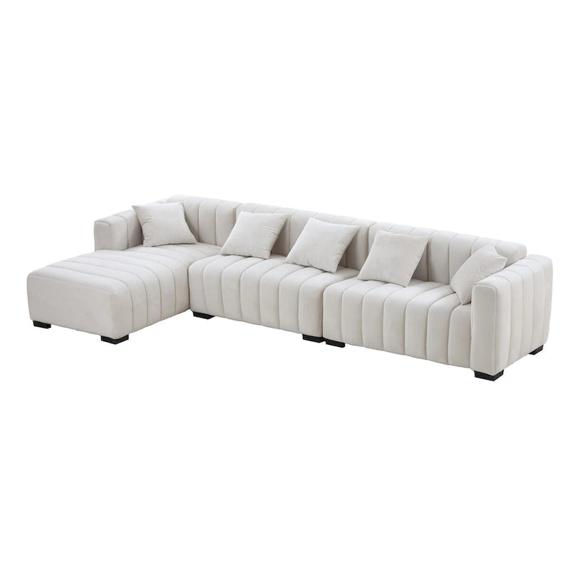 Sofá modular tapizado en terciopelo con capitoné y chaise longue izquierda