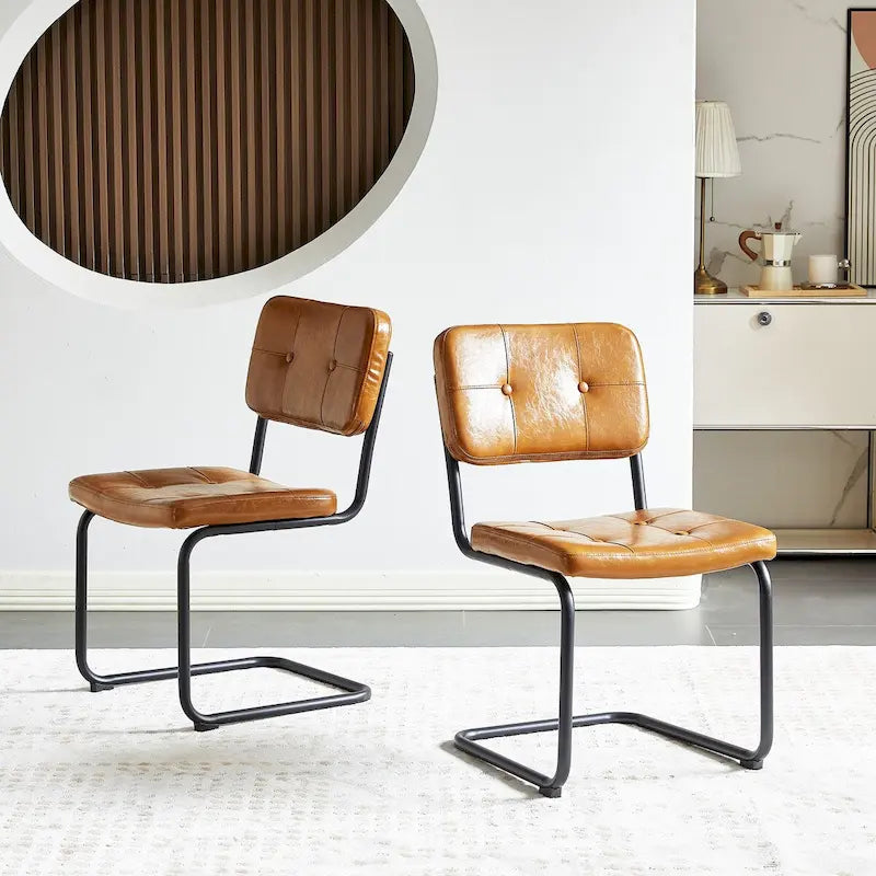 Silla de comedor moderna y sencilla de cuero con tubo metálico